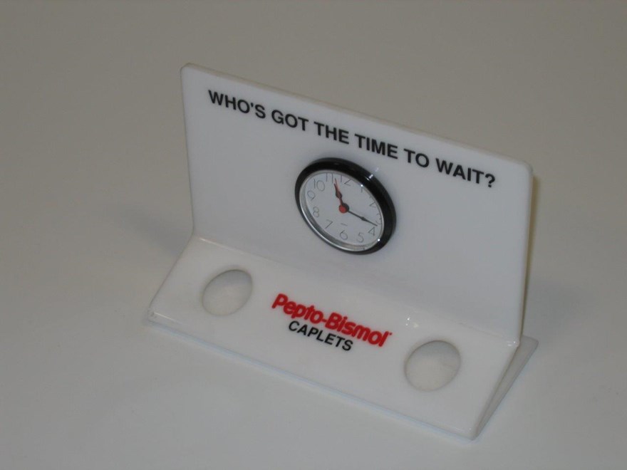 Pepto-Bismol_sign_w_clock