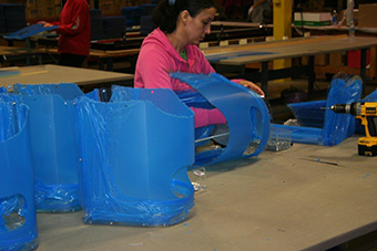 Female worker on finishing line