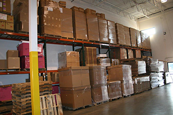 Boxes on shelves in warehouse