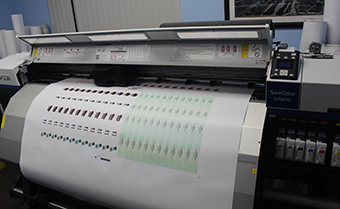 Closeup of large format printing machine